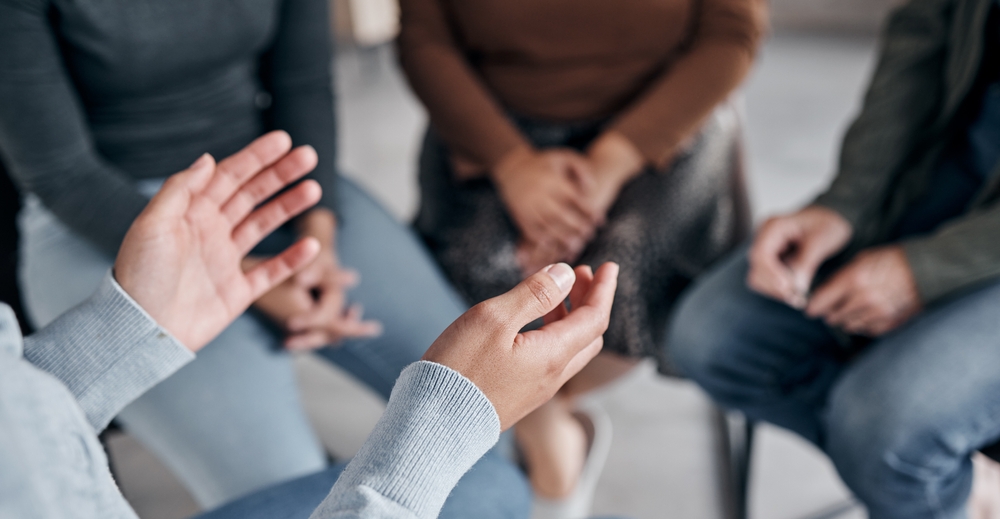 People sitting in a counselling group